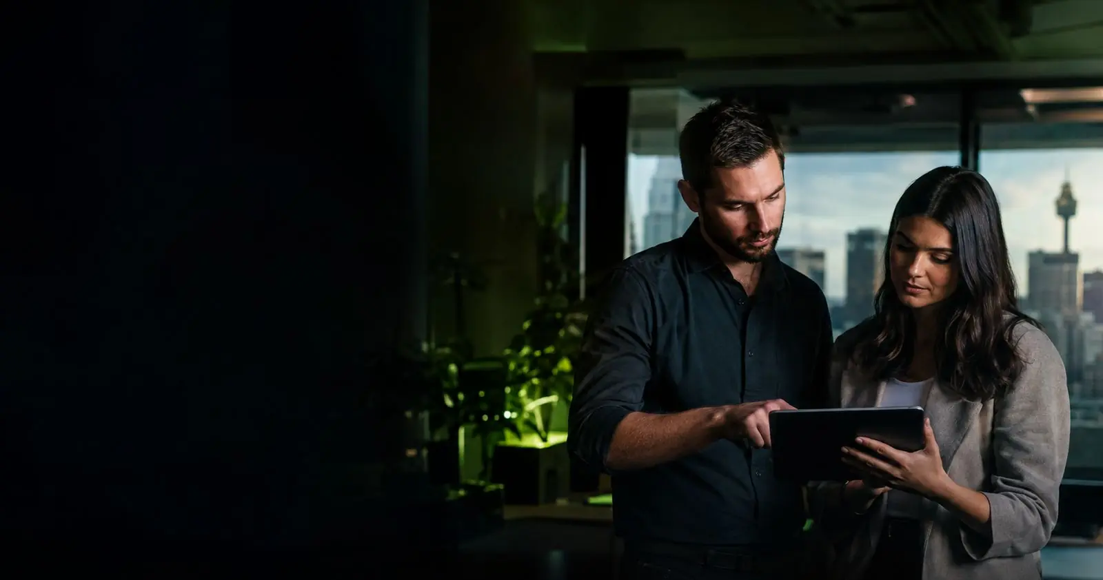 Reviewing a CRM sales pipeline on a tablet